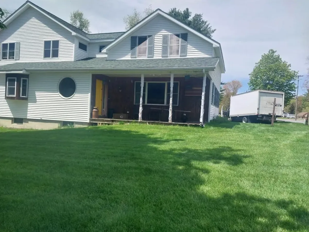 Farmhouse after new gutters and exterior refresh by S&T Seamless