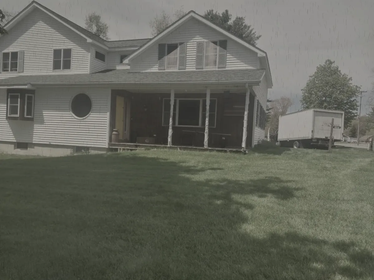 Farmhouse exterior before the project