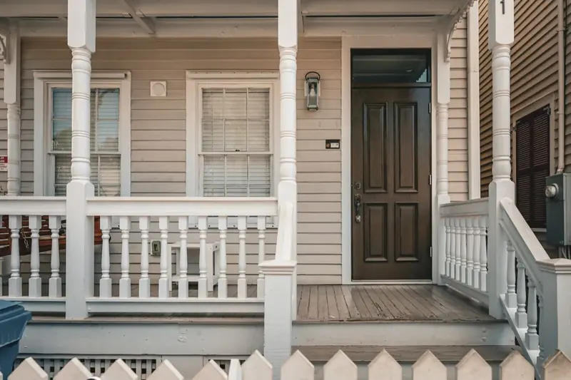 Freshly painted porch, columns and railings on a Central New York home
