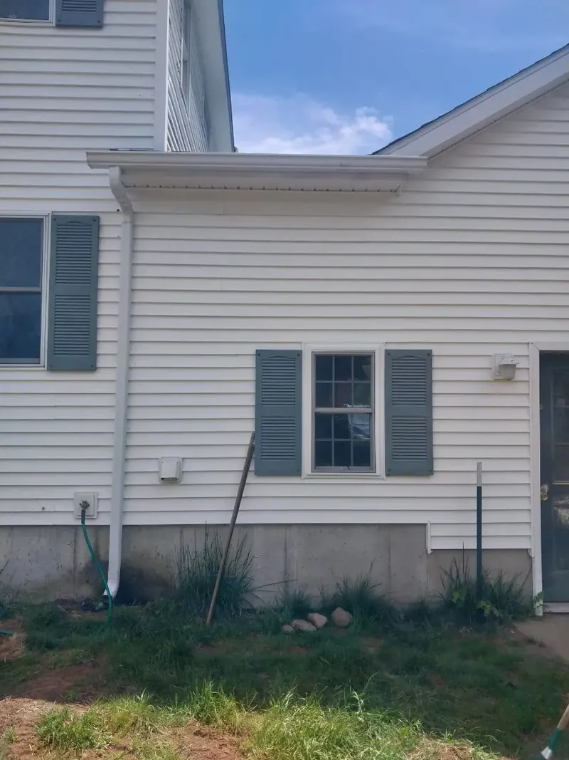 Downspout placement to move water off the foundation